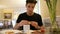 Attractive Young Man Eating Breakfast