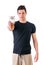 Attractive young man holding protein shake bottle