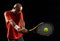 Attractive young man playing tennis portrait