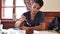 Attractive young man in restaurant eating