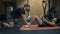 Attractive young people doing workout abdominal training slow motion video