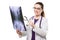 Attractive young woman doctor looking at x-ray making diagnosis in white uniform on white background