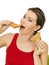 Attractive Young Woman Eating Slices of Sesame Toast