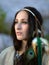 Attractive young woman and feather headpiece