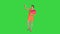 Attractive young woman holding different blank shopping bags making selfie on a Green Screen, Chroma Key.