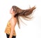 Attractive young woman lets her hair fly
