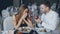 Attractive young woman is saying yes to marriage proposal. Romantic relationship and restaurant date concept