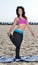 Atttractive woman working out on beach