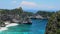 The Atuh beach, Nusa Penida island near Bali, Indonesia. Aerial zooming view at sea and cliff. Turquoise water