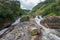 Atukkad Waterfalls near Munnar in Kerala, South India on cloudy day in rain season