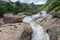 Atukkad Waterfalls near Munnar in Kerala, South India on cloudy day in rain season