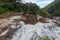 Atukkad Waterfalls near Munnar in Kerala, South India on cloudy day in rain season