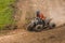 ATV racer takes a turn