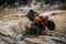 ATV rider in hard dirt track. Extreme ride