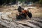 ATV rider in hard dirt track. Extreme ride