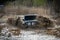 ATV and UTV rider driving in water hard road. Extreme offroad ride. 4x4