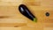 Aubergine or eggplant with slices on wooden background. Close up view