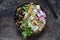 Aubergine, quinoa and tofu in coconut bowl