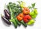 Aubergines, tomatoes, peppers, broccoli on a light background, top view. Flat lay, copy space. Healthy food concept