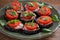 Aubergines with tomatoes and sauce. Pan fried eggplants. Healthy vegetarian food, appetizer.