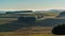 Aubrac, France - Timelapse - Lights and Shadows Over the Hills Alone House in the Landscape