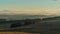 Aubrac, France - Timelapse - Mist Over Lowlands Moving Fast at Sunrise Beautiful Landscape Trees in the Shadows