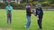 Auckland, New Zealand, 10th of Nov 2019, adults and kids playing nerf gun together at an outdoor children playground