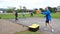 Auckland, New Zealand, 10th of Nov 2019, adults and kids playing nerf gun together at an outdoor children playground