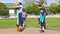 Auckland, New Zealand, 10th of Nov 2019, adults and kids playing nerf gun together at an outdoor children playground