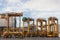 AUCKLAND, NEW ZEALAND - APRIL 2, 2012: 4 straddle carriers and stack of containers at port.