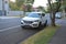 AUCKLAND, NEW ZEALAND - Dec 31, 2020: white Hyundai suv parked on side of suburban road