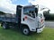 AUCKLAND, NEW ZEALAND - Sep 24, 2020: View of Sunset Concrete Isuzu N Series truck packed on green lawn