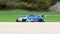 Audi RS3 racing touring car action speed action on racetrack blurred motion