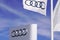 Audi sign text flag and brand logo of vehicle shop German automobile dealership car