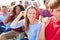 Audience Cheering At Outdoor Concert Performance