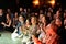 The audience clapping in a concert at Luz de Gas club