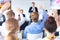 Audience raising their hands in a business conference