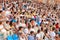 The audience in the stands at a football match