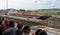 Audience watches as ship is moved through the Panama Canal