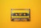 Audio cassete on yellow