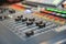 Audio mixer, music equipment. recording studio gears, broadcasting tools, mixer, synthesizer. shallow dept of field for music