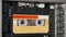 Audio Tape Recorder Playback, Insert and Eject Yellow Audio Cassette Close-Up