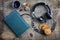 Audiobook headphones and book on wooden table