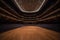 The auditorium of the theater with a wooden floor and seats. A luxurious and huge empty concert hall, Ai Generated