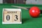 August 03, number cube on snooker table, sport background.