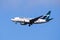 August 19, 2019 San Francisco / CA / USA - WestJet aircraft landing at San Francisco Airport; WestJet Airlines Ltd. is a Canadian