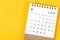 A August 2023 Monthly desk calendar for 2023 year on yellow background