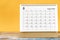 The August 2023 Monthly desk calendar for 2023 year on yellow background