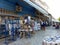 August 7th, 2018. Tourists choose souvenirs in a souvenir shop in one of the streets of the Vathi town the capital and main