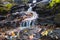 Augusta Canal Trail waterfall on rock slabs long shutter